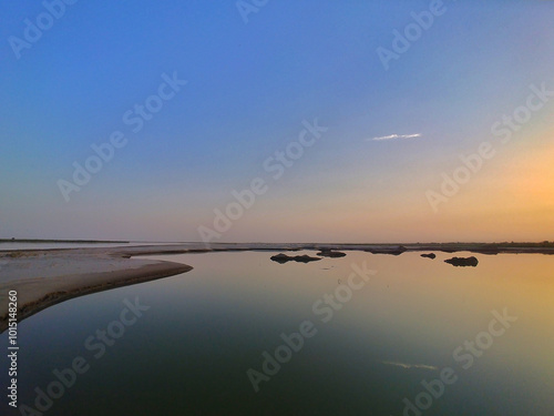 The Indus River. 
Pakistan's lifeline, harboring the ancient Indus Valley Civilization and nurturing diverse wildlife, flora, and vital migratory bird habitats along the Indus Flyway Zone.