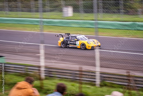 High-Speed Action at Monza Circuit: Dynamic Racing Car Captured in Motion