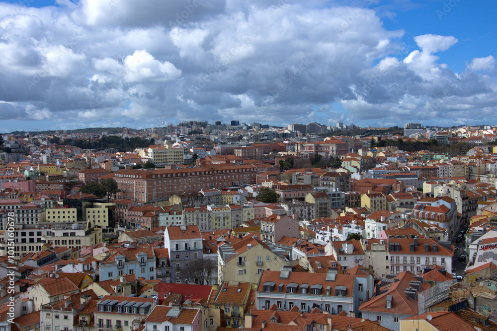 Lisbon, Portugal. Lisbon urban buildings panorama landscape, view of colorful buildings. blue sky with white clouds Lisbon, Portugal. Lisbon urban buildings panorama landscape, view of colorful buildings. blue sky with white clouds