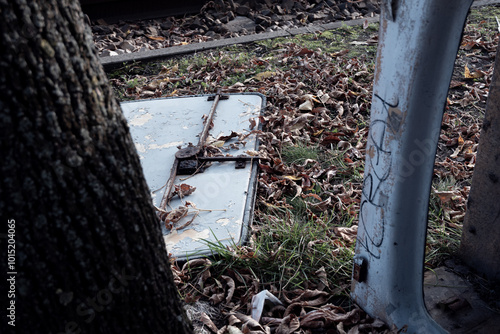 Destroyed metal doors lying on the ground