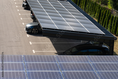 Parking space with solar panels on a roof photo