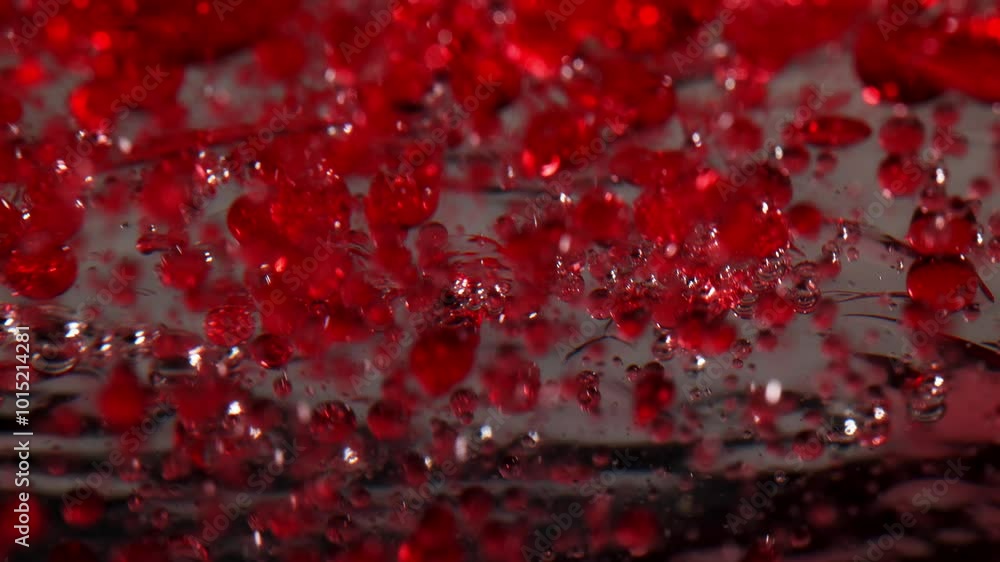 enchanting dance of colourful liquids revealing captivating patterns of dynamic movements, red bubbles of oil floating in the water enchanting dance of colourful liquids revealing captivating patterns of dynamic movements, red bubbles of oil floating in the water