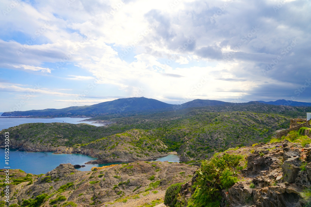 Obraz premium Cap de Creus: Rocky landscape and famous hiking trail Cami de Ronda on the Mediterranean Sea with a view along the spanish coast, border of Spain and France near Cadaqués, Girona, Pyrenees, Catalonia