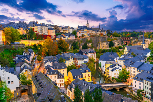 Luxembourg City: Sunset cityscape of a beautiful small EU country with the old town, Alzette River and Grund district, Europe travel destination photo