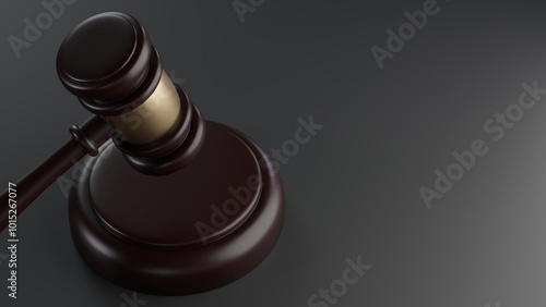 3d rendering of wooden court gavel, or auction hammer, on dark background.