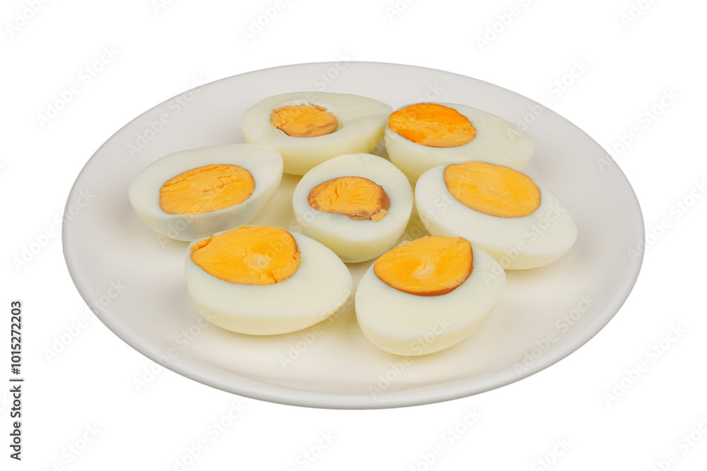 Slices of peeled boiled eggs on a white plate isolated transparent Slices of peeled boiled eggs on a white plate isolated transparent