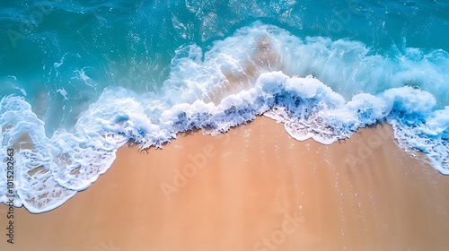 Aerial view of beautiful tropical beach and sea with sand and wave