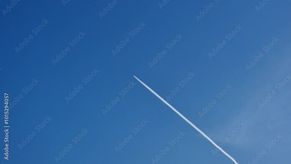 The plane flies over Riga in the blue sky The plane flies over Riga in the blue sky