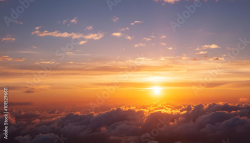 Sun Setting Over Clouds in Sky and Copy Space