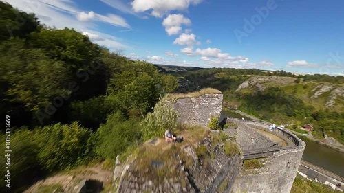 Aerial fpv drone video of flying around Crevecoeur Castle, ruined castle in Bouvignes-sur-Meuse, part of the Belgian city of Dinant, province of Namur, Wallonia photo