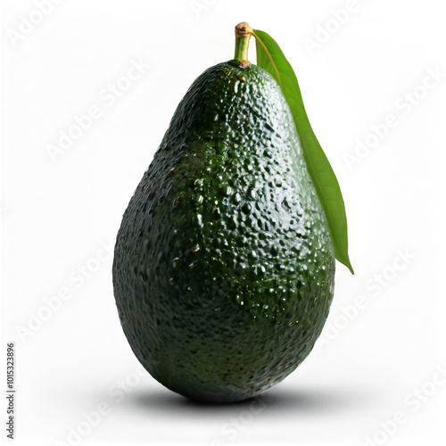Fresh ripe avocado with green leaf displayed against a clean white backdrop