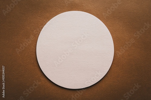 Blank white circle coaster centered on a brown background, creates a minimalist, modern aesthetic, mockup. Ideal for showcasing logos, designs, branding concepts.
