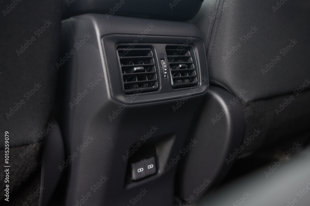 A close up of a car s rear air conditioning system