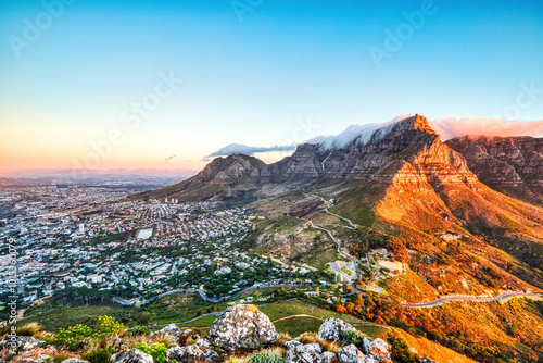 Cape Town Sunset over Camps Bay Beach with Table Mountain and Twelve Apostles in the Background