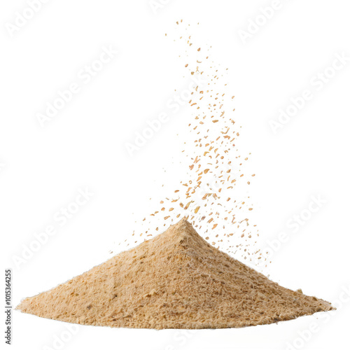 Fine powder formed from ground spices on a white surface displaying its texture and color
