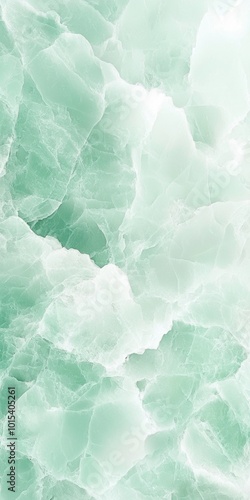 Polished green marble stone texture as abstract background, showing the natural vein pattern of the mineral, useful as building material or interior design