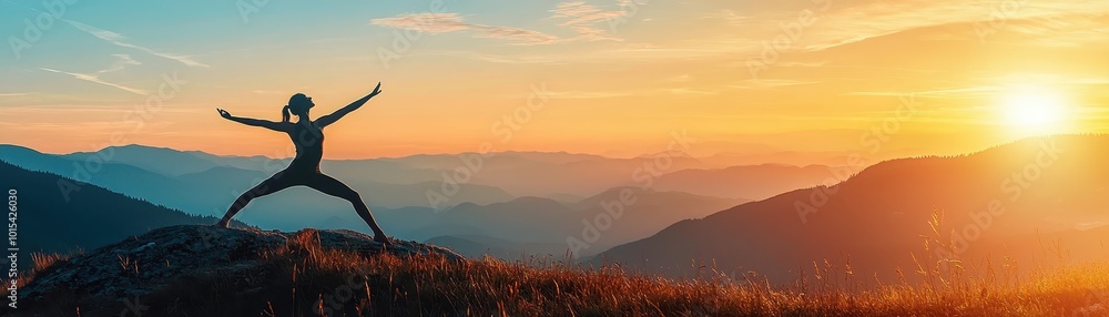 Silhouette of a person practicing yoga on a hilltop at sunrise with scenic mountains in the background, symbolizing peace and nature. Silhouette of a person practicing yoga on a hilltop at sunrise with scenic mountains in the background, symbolizing peace and nature.