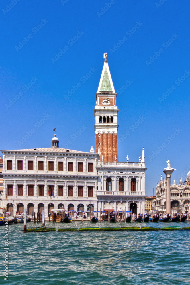 Busy gandola terminal by the tower, Venice, Italy