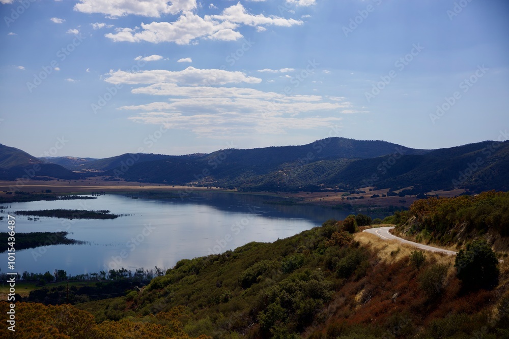 lake in mountains with early fall foliage lake in mountains with early fall foliage
