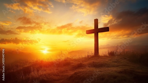 Cross silhouetted against a vibrant sunrise sky