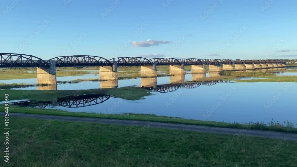 A long bridge reflected in the sky over a wide river, Langenfeld, Dömitzer Brücken, World War II, Elbe, Wendland, Lower Saxony, Germany, Europe A long bridge reflected in the sky over a wide river, Langenfeld, Dömitzer Brücken, World War II, Elbe, Wendland, Lower Saxony, Germany, Europe