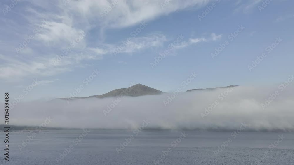 Morning fog over Loch Linnhe at the narrows near Ardgour, drone image, Western Highlands, Scotland, Great Britain Morning fog over Loch Linnhe at the narrows near Ardgour, drone image, Western Highlands, Scotland, Great Britain