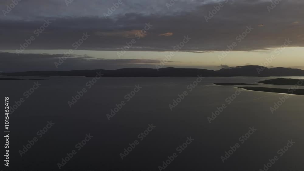 Sunset with view to the island of Hoy, drone shot, Bay of Orphir, Scapa Flow, Orkney, Scotland, Great Britain Sunset with view to the island of Hoy, drone shot, Bay of Orphir, Scapa Flow, Orkney, Scotland, Great Britain