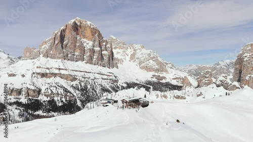 Aerial view of ski resort lodge with skiers near Cinque Torri Dolomites Mountain