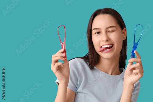 Funny young woman with tong...