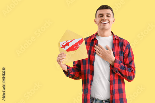Young man with gift voucher...