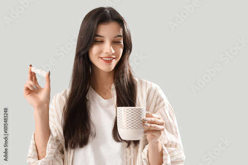 Beautiful young woman with ...