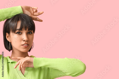 Stylish young woman with no...