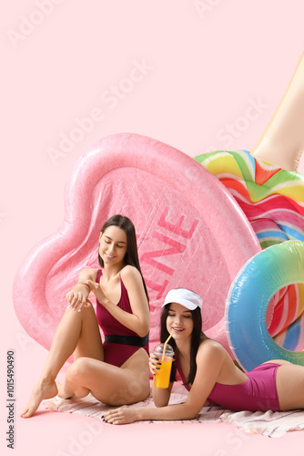 Female friends in beachwear...