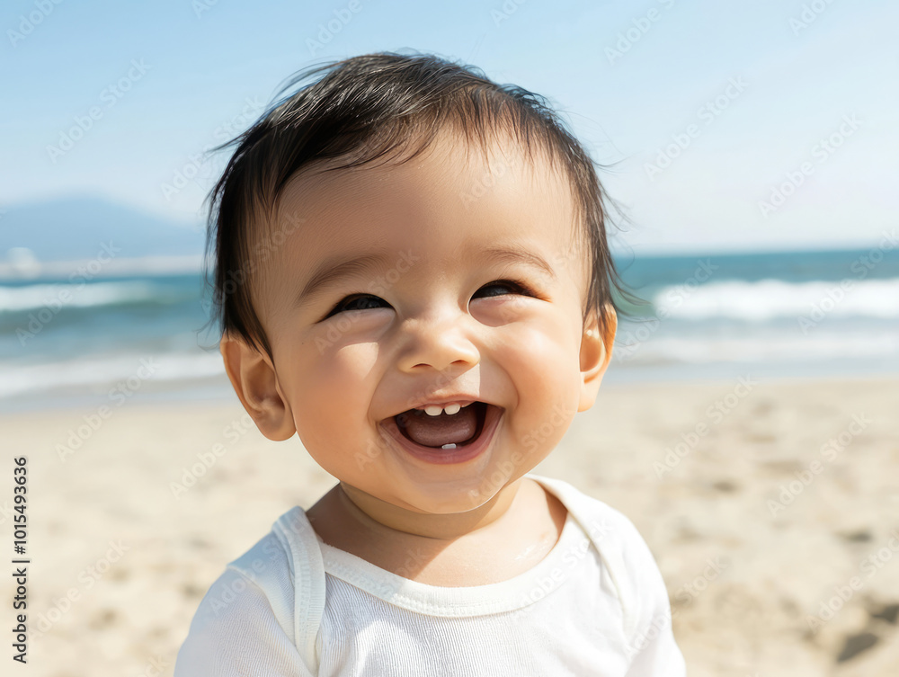 asian infant baby boy is playing on the sand at the beach asian infant baby boy is playing on the sand at the beach