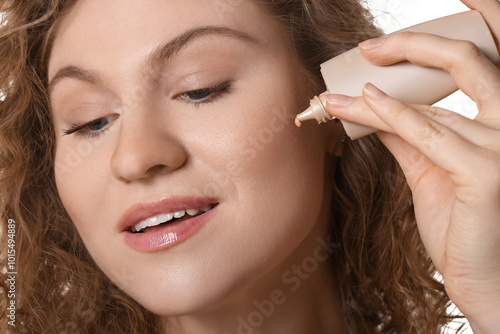 Beautiful young woman with ...