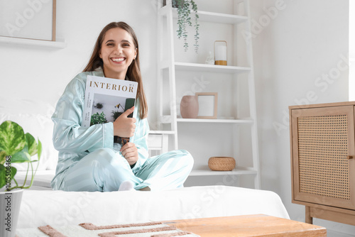 Young woman in pajamas with...