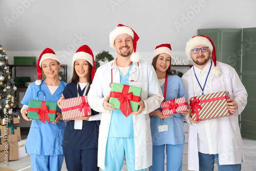 Group of doctors in Santa h...