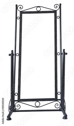 Obraz na płótnie A freestanding metal mirror frame with ornate scrollwork and a sturdy base, showcasing a vintage, handcrafted design. Perfect for adding elegance to any space. w salonie