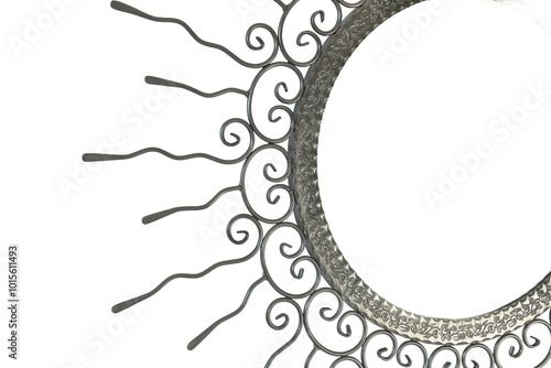 Obraz na płótnie An intricate metal sunburst featuring swirling, ornamental wire rays and a circular, hollow center. The handcrafted design exudes a vintage, artisanal charm, perfect for decorative use. w salonie