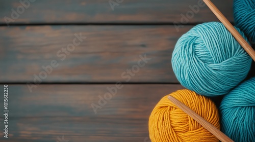 Brightly colored yarn and crochet hook laying on a rustic wooden table, creative workspace, cozy and inviting, handmade textile craft photo