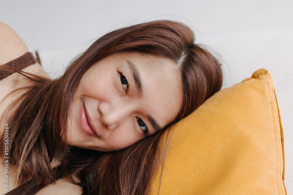 Close up of happy asian woman selfie herself enjoy relaxing on sofa and pillow. Close up of happy asian woman selfie herself enjoy relaxing on sofa and pillow.