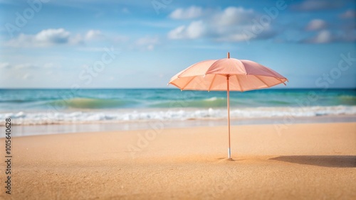 Pastel peach color beach umbrella sticking out of the sand, beach, umbrella, sand, pastel, peach, color, summer, vacation