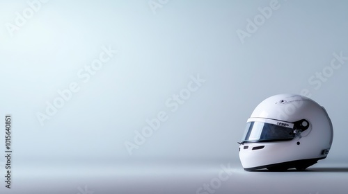 A shiny white racing helmet is angled against a light grey background. The clean visor area allows for logo placement, enhancing design possibilities in commercial photography photo