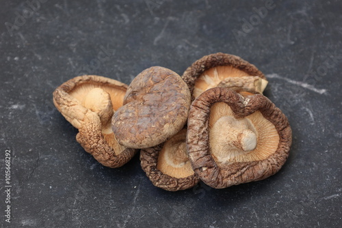 mushrooms on a wooden backgroundon black  photo