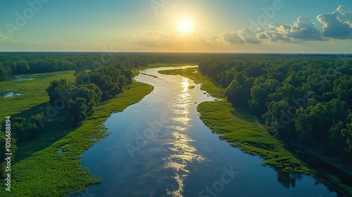 Aerial view of floodplains between a river and a dike, showing submerged land during the high water season.