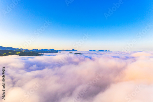 Aerial view of cloud over Dumulmeori(Yangsu-ri) after sunrise near Yangpyeong-gun, Korea. Dumulmeori is the place where the North and South Han Rivers join.  photo