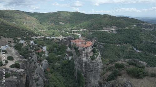 Wallpaper Mural A breathtaking drone video captures the towering rock formations and monasteries of Meteora, Greece, with sweeping views of valleys and lush greenery below. Torontodigital.ca