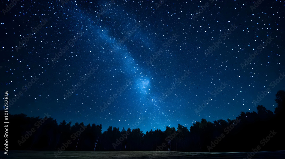 A Night Sky Photography Capturing the Milky Way with a Silhouetted Forest in the Foreground A Night Sky Photography Capturing the Milky Way with a Silhouetted Forest in the Foreground