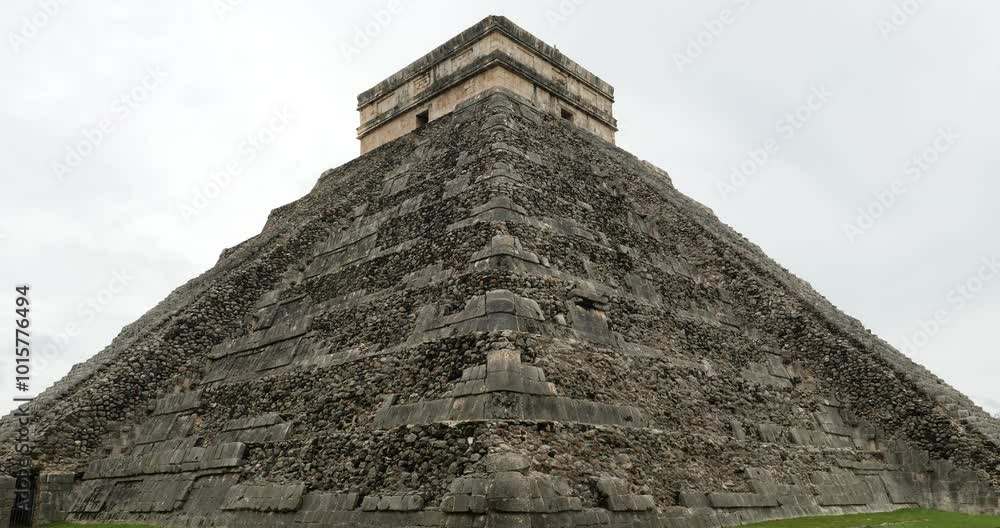 The damaged side of Temple of Kukulcán (El Castillo), Chichen Itza archeological site. The damaged side of Temple of Kukulcán (El Castillo), Chichen Itza archeological site.