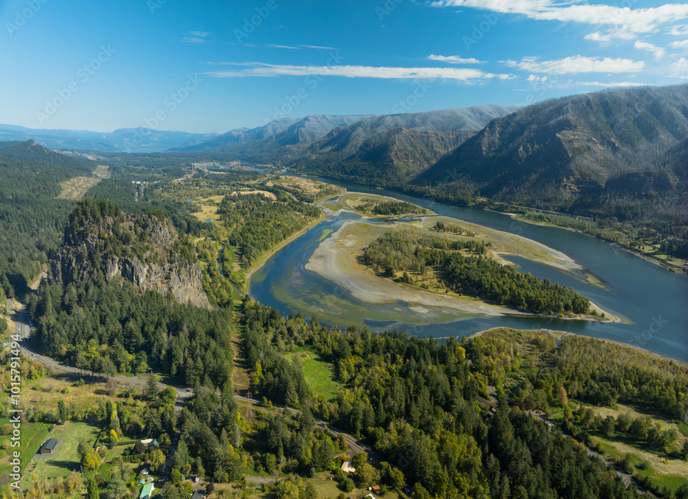 A beautiful mountain range with a river running through it A beautiful mountain range with a river running through it